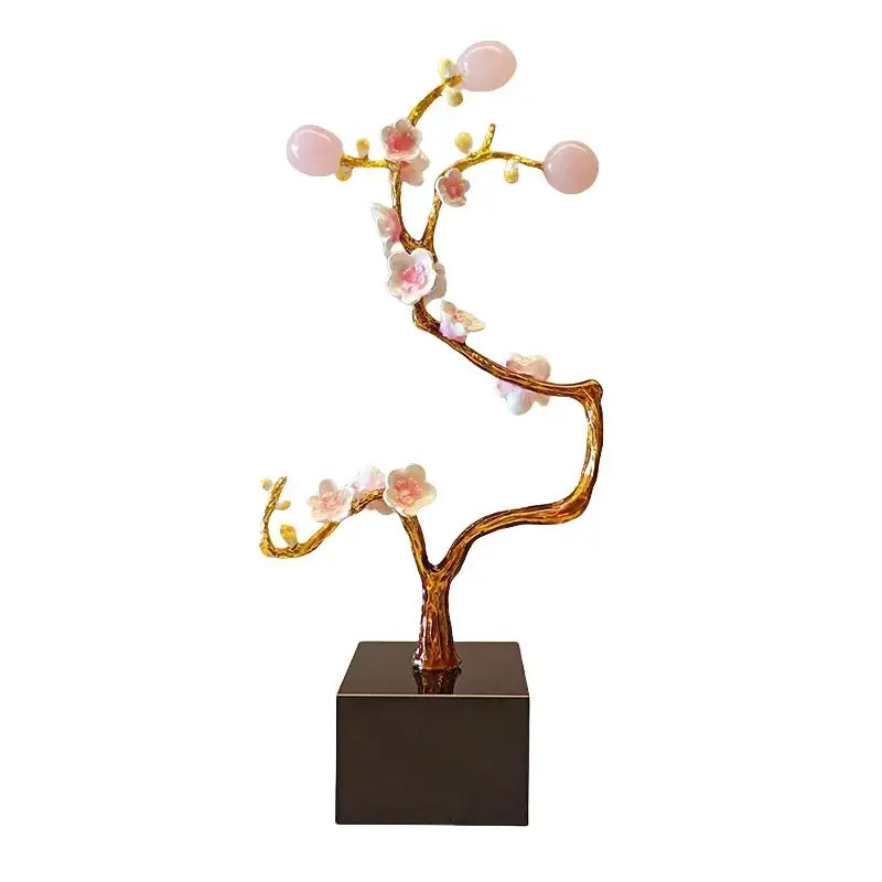 Delicate pink cherry blossom golden tree metal decor figurine with gold-toned branches and translucent stones on black base