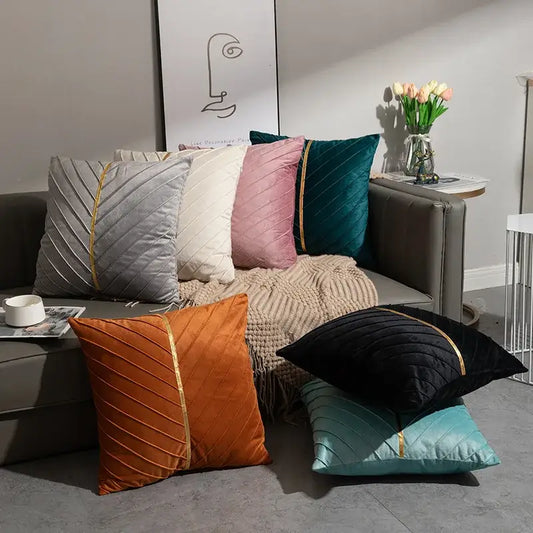 Set of six decorbites golden velvet patchwork cushion covers in muted tones with gold piping accents for living room decor