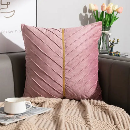 A soft pink velvet cushion cover from decorbites golden velvet patchwork set featuring chevron pattern and gold piping