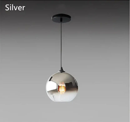 Silver spherical pendant light with reflective gradient glass ball and black metal suspension for dining room chandelier