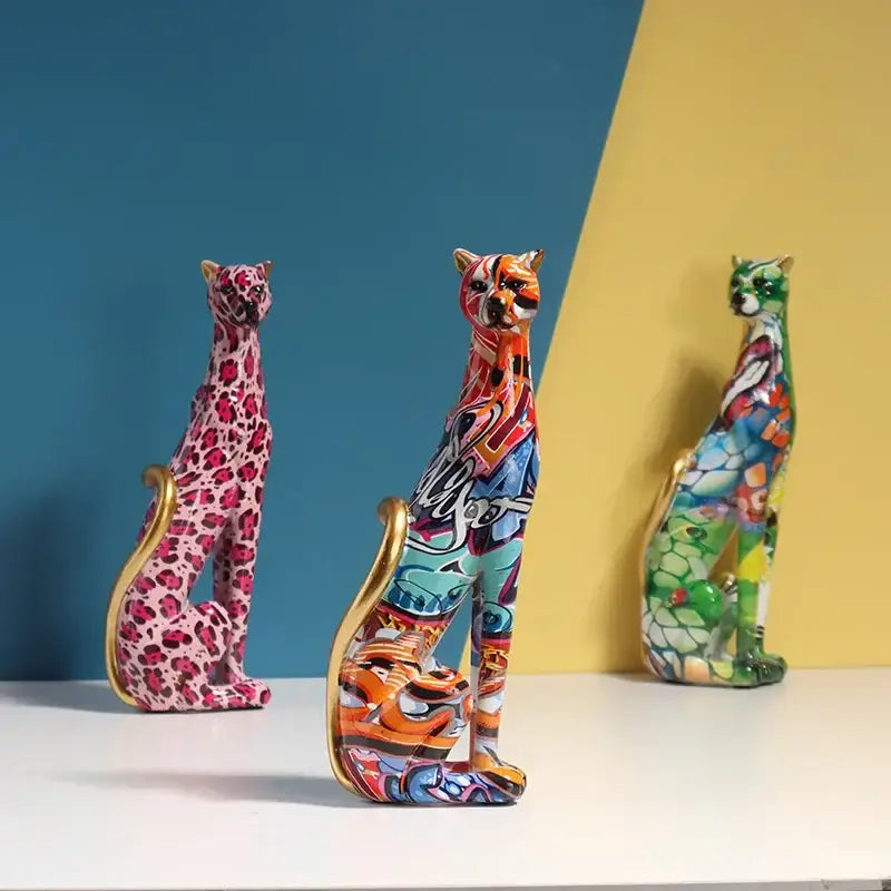 Vibrant graffiti-style ceramic cat figurines with gold-trimmed edges for decorbites leopard resin sculpture decor