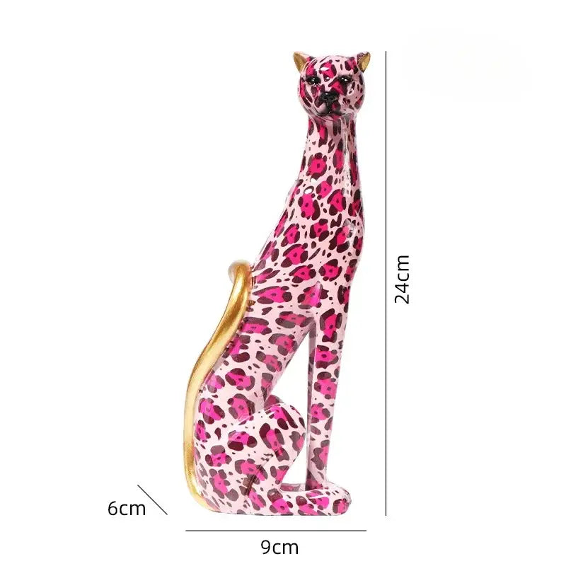 A sleek 24cm tall pink and dark purple glossy decorbites leopard resin sculpture with gold-trimmed tail for living room decor