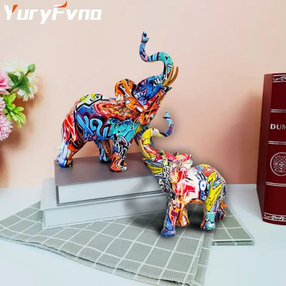 Vibrant graffiti resin elephant sculpture by decorbites featuring bold colors and intricate designs for living room decor
