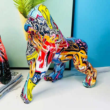 Vibrant resin decorbites gorilla sculpture with bold yellow red blue and pink graffiti street art for living room decor