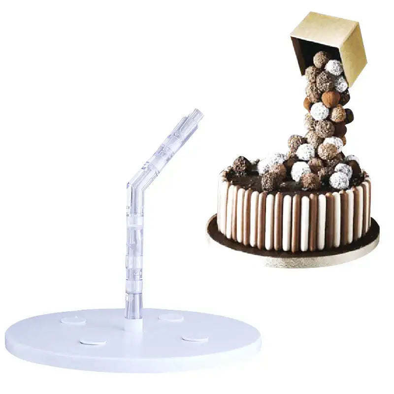 A clear plastic white cake stand with a curved segmented arm and circular base for gravity defying stand support structure