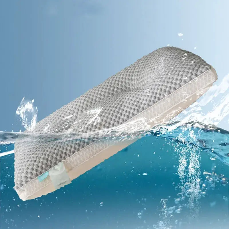 Gray and beige honeycomb memory foam cooling pillow with decorbites ice rayon partially submerged in water