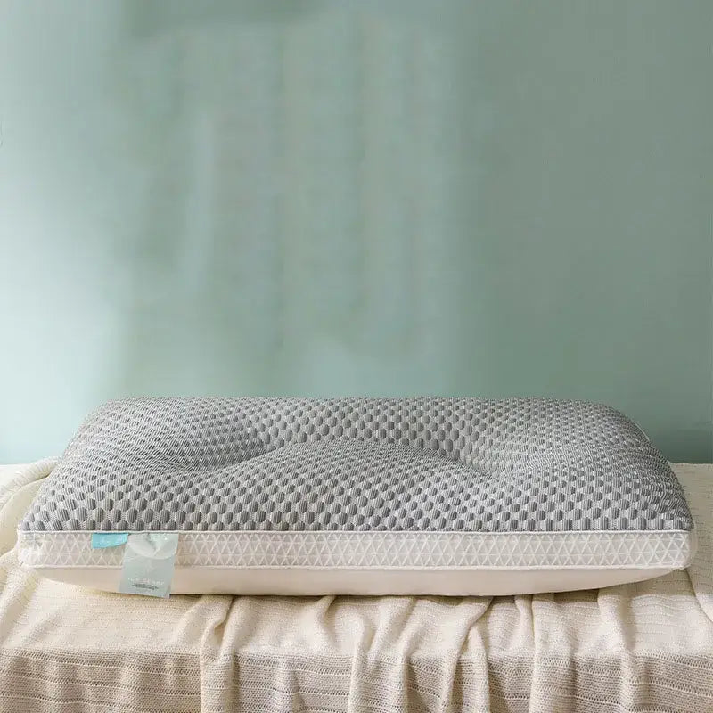 Gray honeycomb textured memory foam cooling pillow with white stitched border and light blue decorbites ice rayon tag