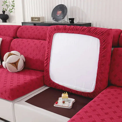 Red quilted fabric sofa cover with white central panel and elasticated edges for gray and white woven elastic sofa slipcover