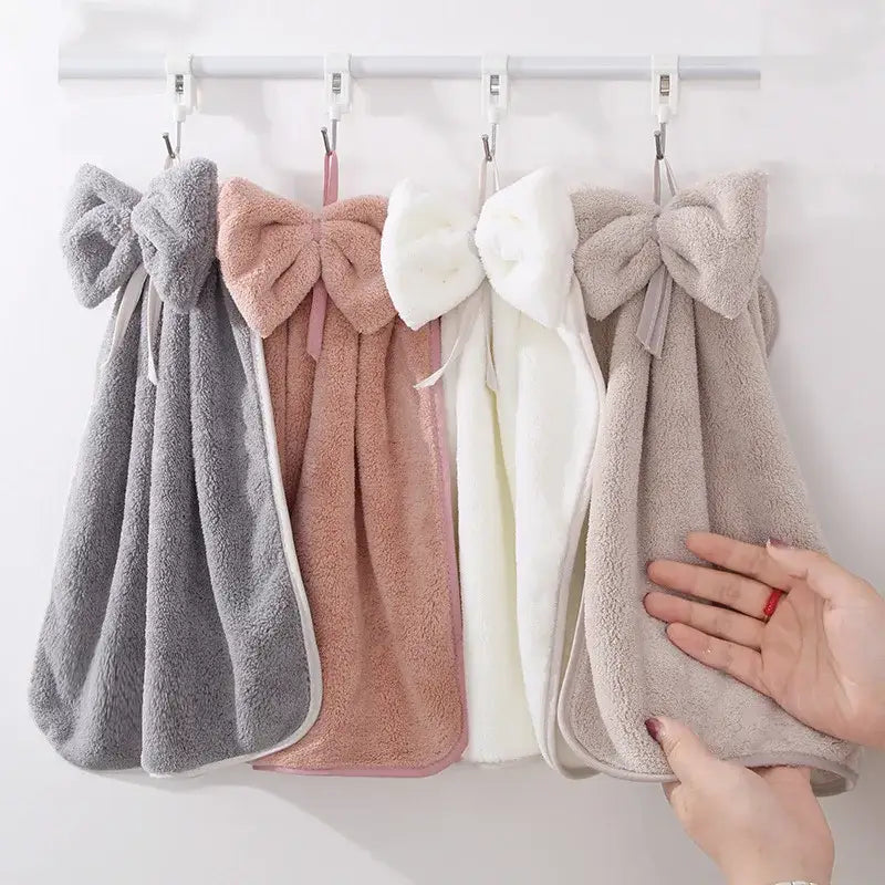 Soft gray and beige decorbites bowknot coral velvet hand towels with plush texture and large bow for kitchen cleaning