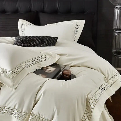 Cream-colored satin duvet set with intricate white lace trim for stylish egyptian cotton hotel bedding set use