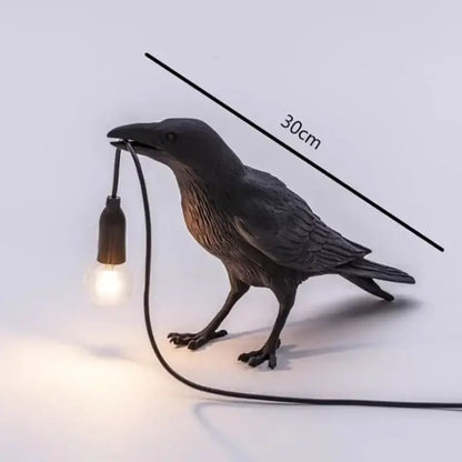 Black ceramic lively bird resin table lamp with glossy textured finish and detailed feathering for bedroom decorbites lively bird