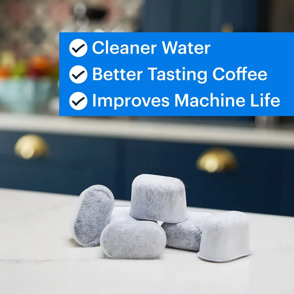 Gray charcoal espresso machine water filter cartridges with textured porous surface for machine water filtration in kitchen