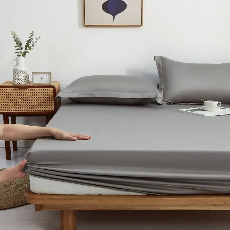 Gray decorbites cotton fitted sheet set featuring a smooth gray satin fitted sheet with neatly tucked edges for bedroom bedding