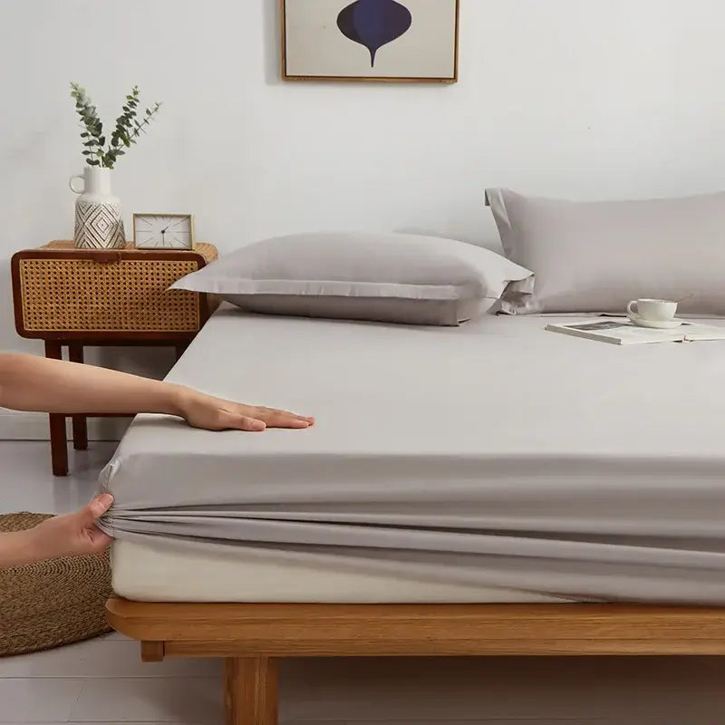 Gray decorbites cotton fitted sheet set featuring a smooth, slightly shiny, stretchy fitted sheet for bedding use