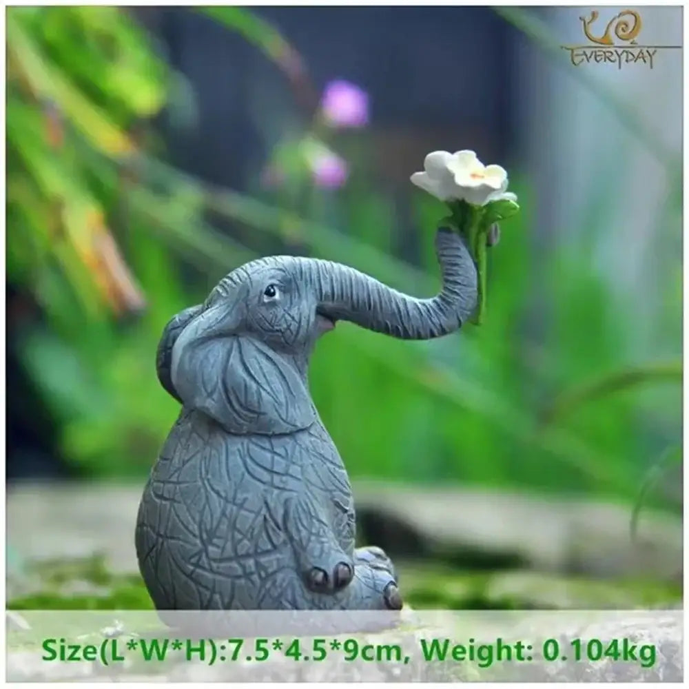 Gray ceramic elephant figurine holding a white flower in its trunk decorbites elephant bird rabbit resin decor for living room