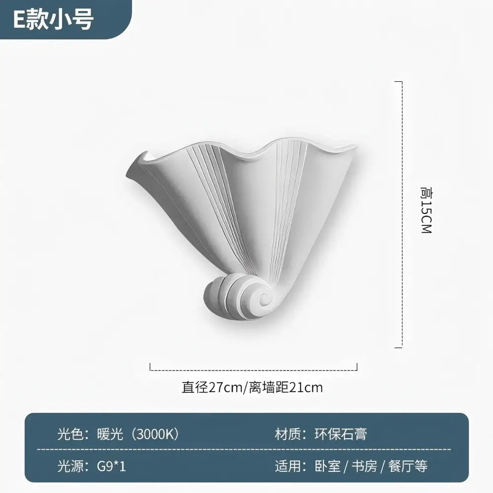 White shell-shaped wall lamp made of eco-friendly resin resembling a gypsum shell led bedroom sconce