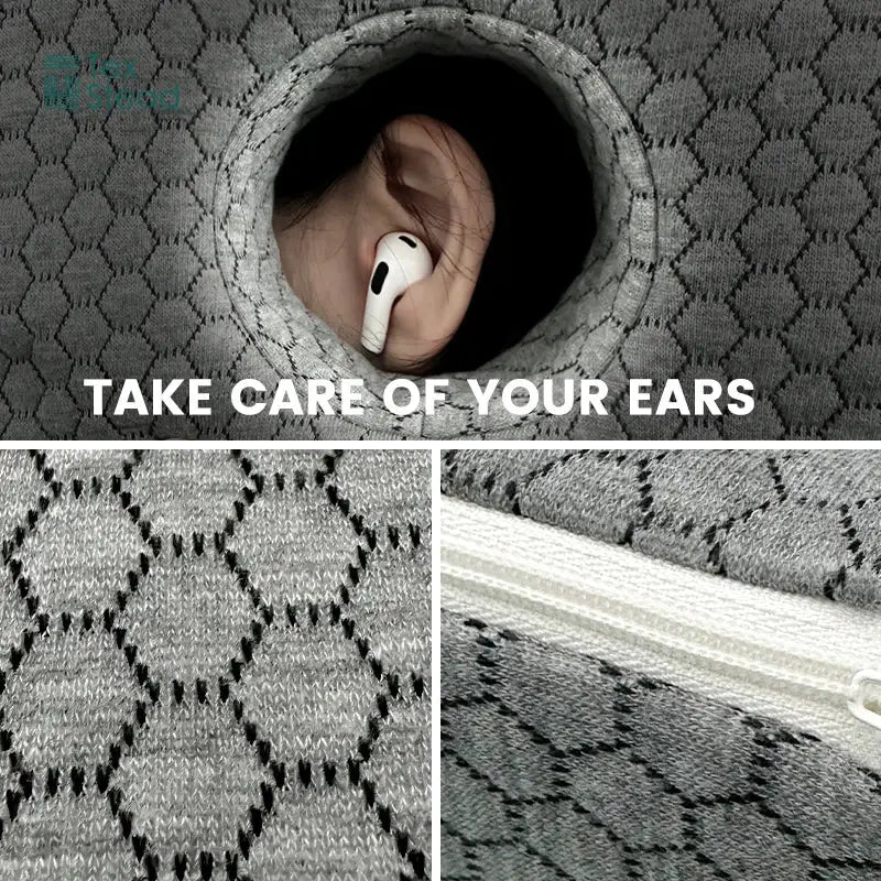 White wireless earbud nestled in gray hexagonal knit fabric pocket of decorbites comfort sleeper pillow for ear hole use