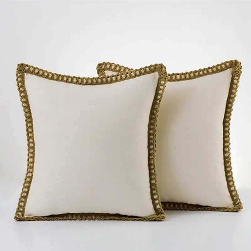Cream-colored linen square throw pillow covers with textured olive-green crochet border for decorbites bedroom decor