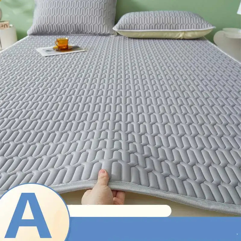 Gray quilted cooling latex summer mat set with textured honeycomb pattern and stitched edges for bedroom use