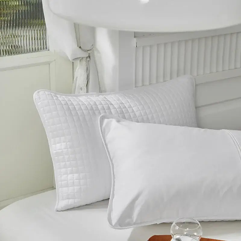 White quilted cotton pillowcase shield with diamond-stitched pattern for bedroom sweat protection by decorbites cotton