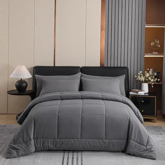 Gray king size quilted comforter with soft plush texture and clean stitched panels for bedroom use
