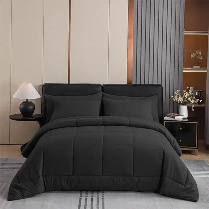 Black king size quilted comforter with soft plush texture and subtle stitching for bedroom use