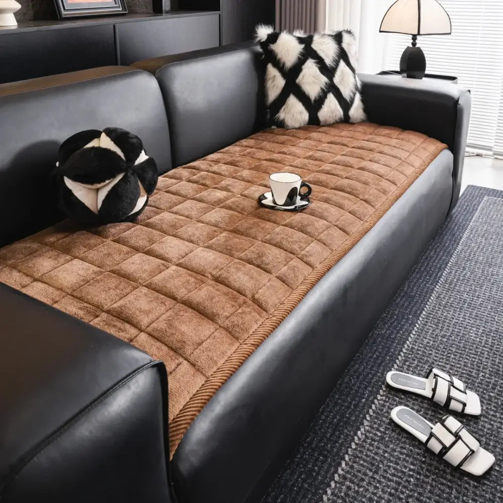 Brown quilted sofa towel with a plush textured surface and stitched grid pattern for living room cushion pad