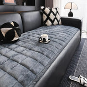 Gray quilted square sofa towel with a plush textured surface and stitched pattern for living room cushions