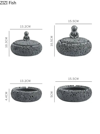 Gray volcanic stone cement astronaut ashtray with textured surface and small astronaut figurine for living room use