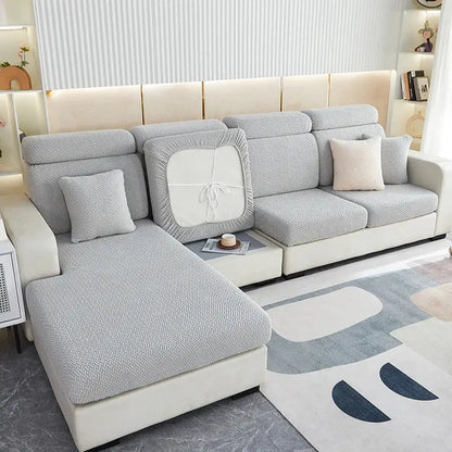 Light gray herringbone decorbites jacquard velvet sofa cover with white central panel and ribbon tie for living room decor