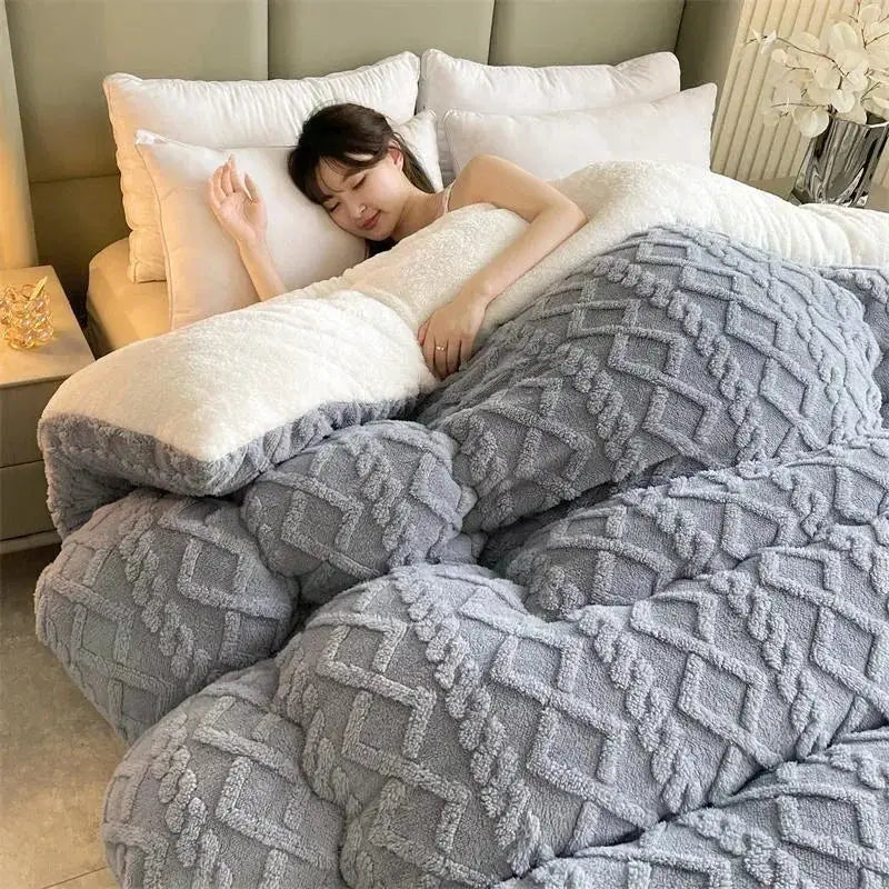 A plush gray and white two-toned fleece cozy winter bed blanket with textured diamond pattern for decorbites cozy winter decor