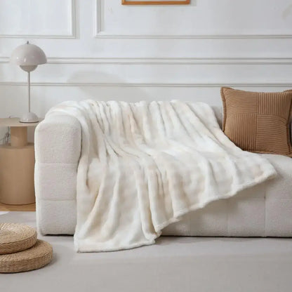 Cream-colored fuzzy faux fur blanket draped over sofa perfect for cozy decorbites fuzzy faux bedroom throw decor