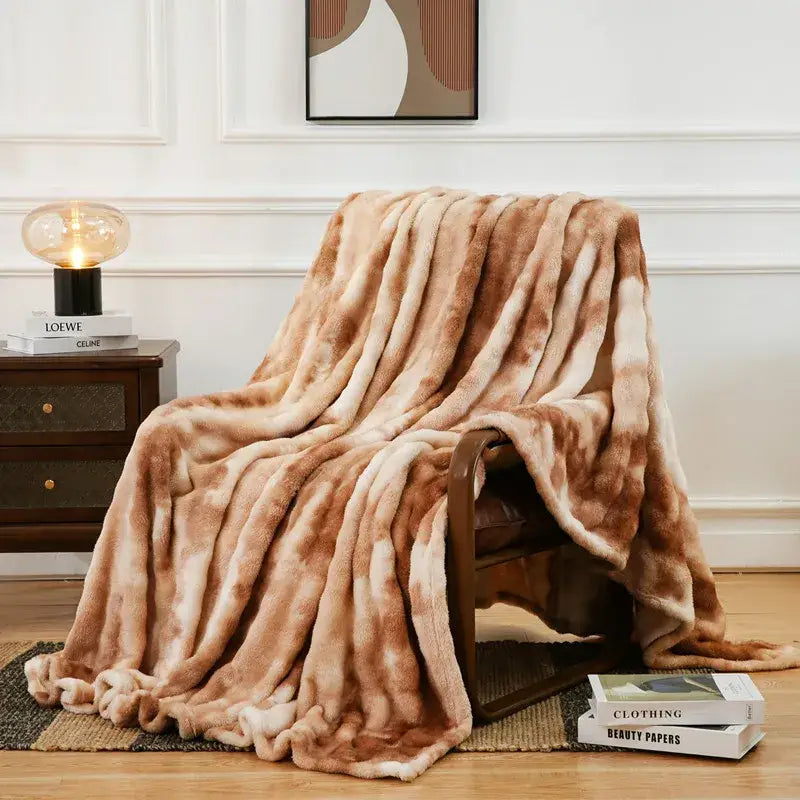 A gray and white tie-dye fuzzy faux fur blanket in soft beige and brown gradient decorbites fuzzy faux throw blanket