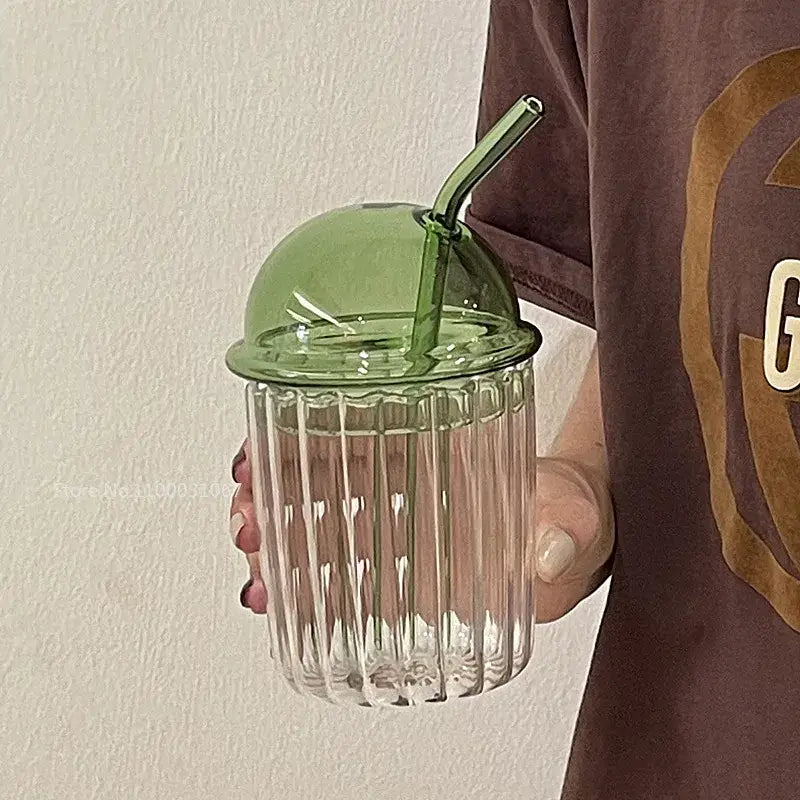 Green 450ml striped glass cup with lid and straw made of translucent green glass by decorbites for kitchen use