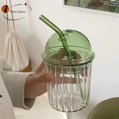 Green 450ml striped glass cup with lid and straw featuring vertical ribbed detailing by decorbites kitchen glassware