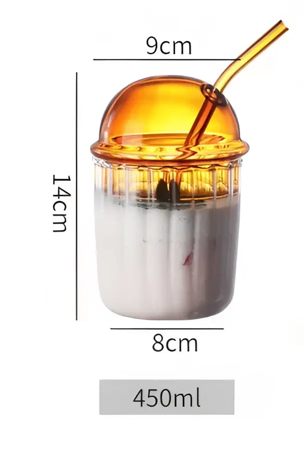 Transparent orange plastic cup with dome lid and straw designed like a frozen drink beside decorbites 450ml striped glass cup with lid and straw