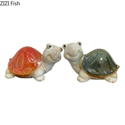 Two ceramic cute turtle statues with glossy orange and green shells for living room decor tray display