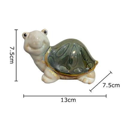 Green ceramic turtle statue with glossy shell and cream body featuring black bead eyes ideal as statue desk decoration