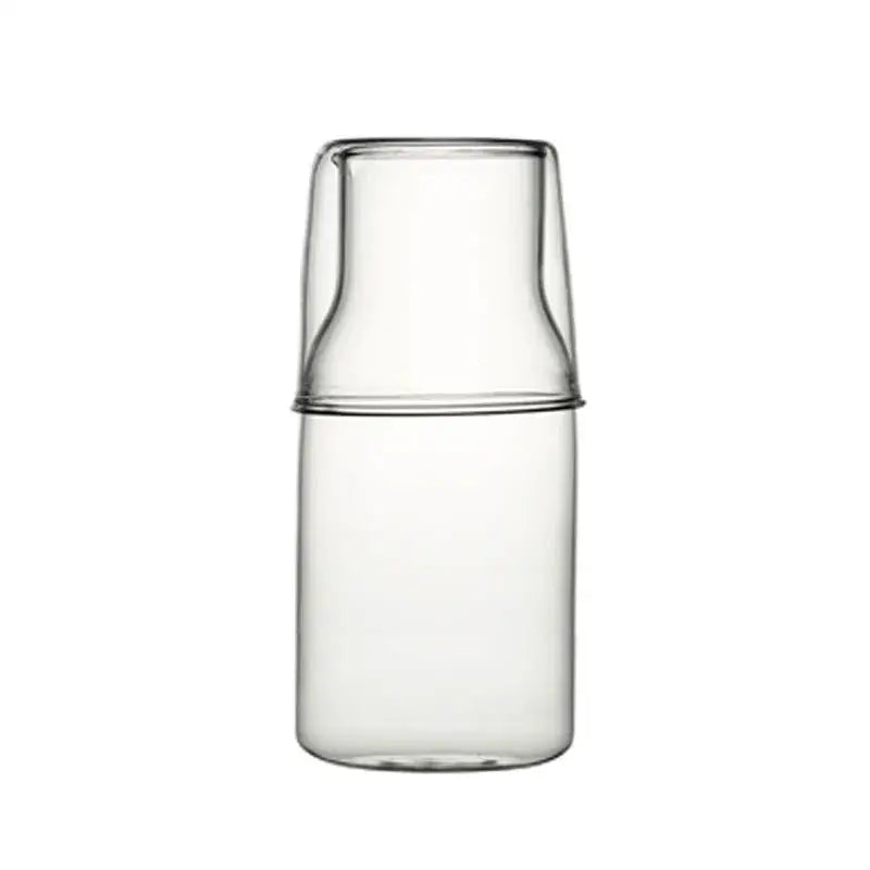 Clear glass 550ml bedside water carafe with matching lid and minimalist design for bedroom use