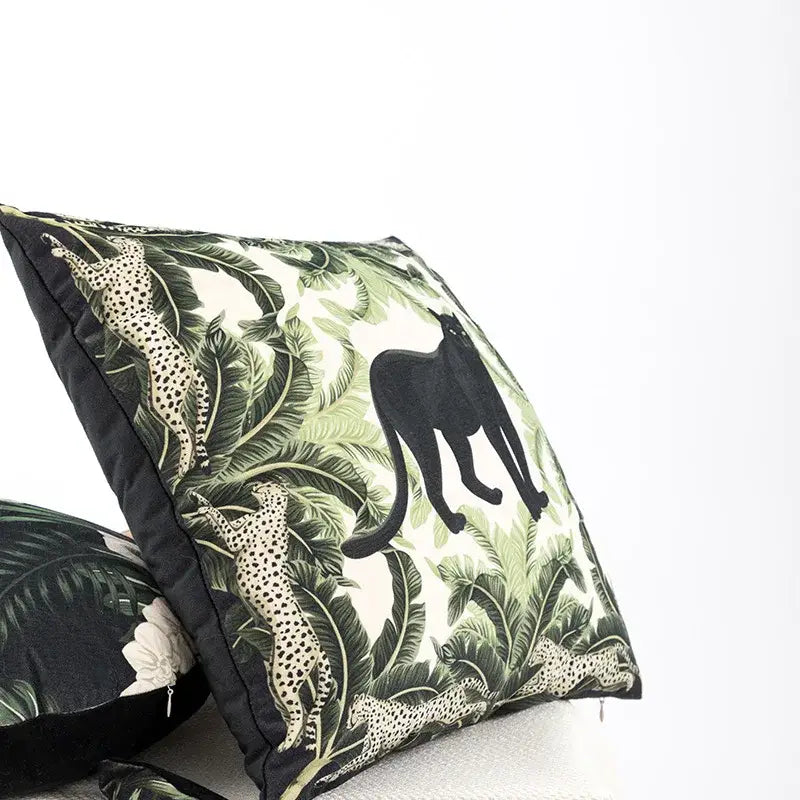 Square premium cushion cover with bold green jungle print featuring black and cream spotted panthers and dark navy border