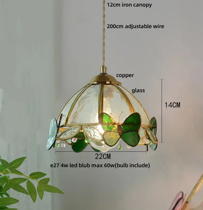 Green stained glass butterfly pendant light with brass copper frame featuring decorbites clear glass panels for bedroom