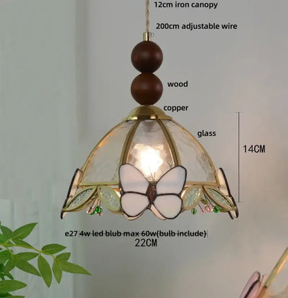 Green stained glass butterfly pendant light with brass accents clear glass led panels and wooden beads decorbites clear glass