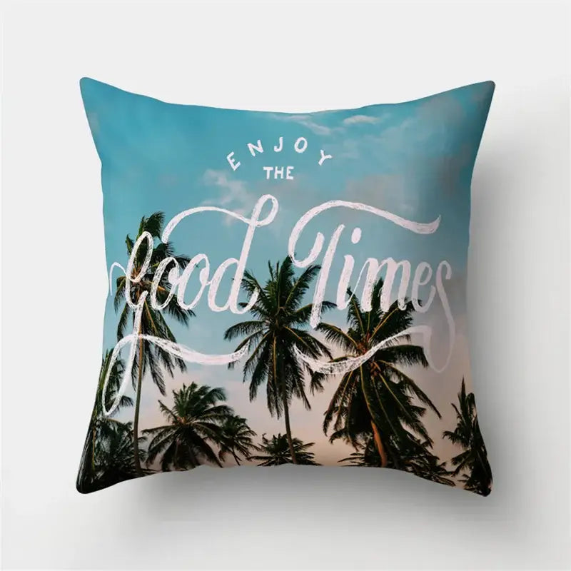 A green tropical leaves square throw pillow with palm tree design and enjoy the good times script for nature decor