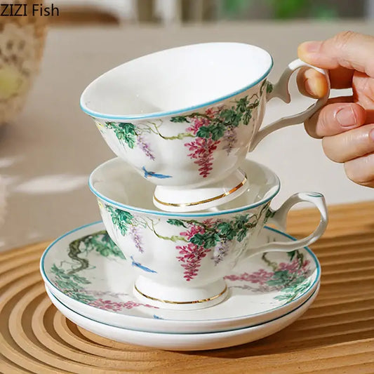 White porcelain green vine flower teacup with pink blossoms gold trim and matching saucer from decorbites green vine set