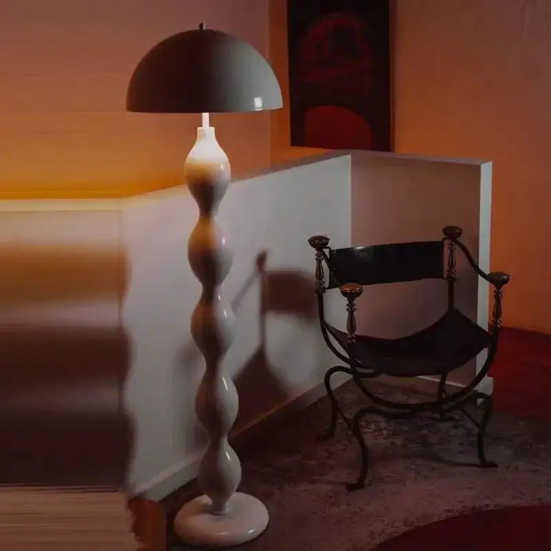 A sleek matte gray shade floor lamp with a twisted white ceramic base for decorbites circle mushroom floor lighting