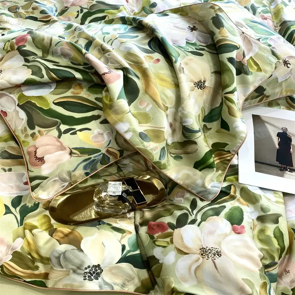 A soft flowing silk scarf in muted greens and creamy whites complements the green and white floral 1000tc egyptian cotton bedding set by decorbites