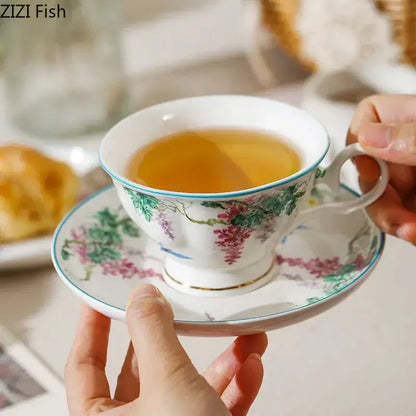 Green willow porcelain tea cup and saucer set with hand-painted pink wisteria and gold trim for decorbites green willow