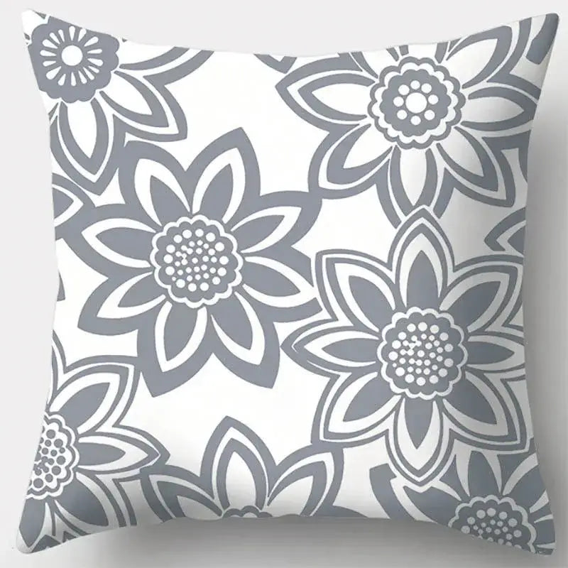 A square throw pillow case with grey geometry patterned stylized flowers on white for living room decor