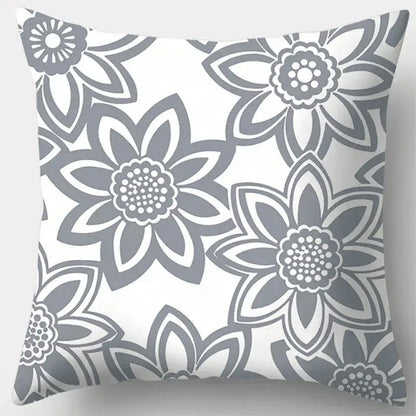 A square pillow case with grey geometry stylized flowers on white background for living room decor
