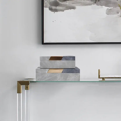 Stacked rectangular grey marble pattern leather jewelry container with gold-toned lids for bedroom desktop organization